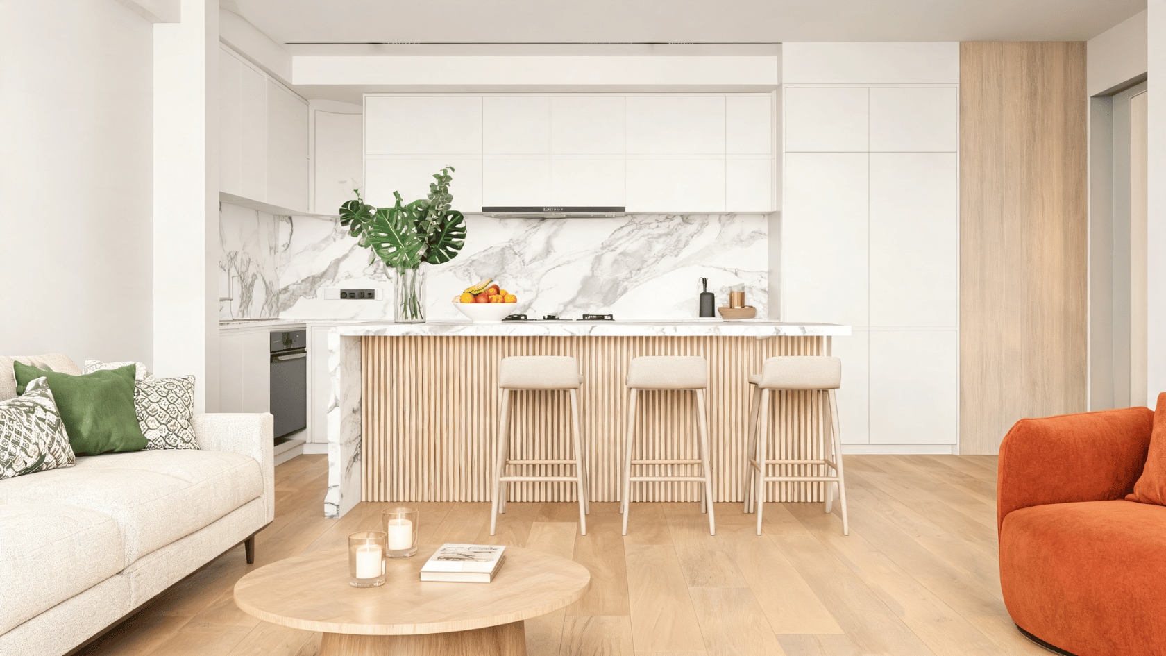 Modern kitchen with white cabinets, marble backsplash, wooden island, stools, and seating area.