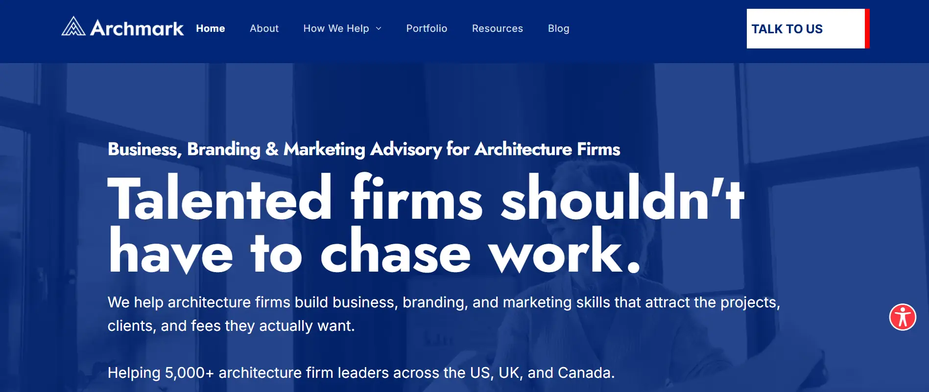 Blue-themed webpage with business branding text overlay and navigation menu at the top