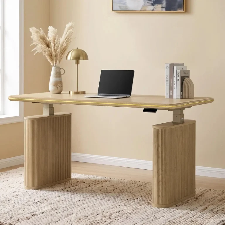 Laptop on modern wooden desk with books and vase in cozy office setting