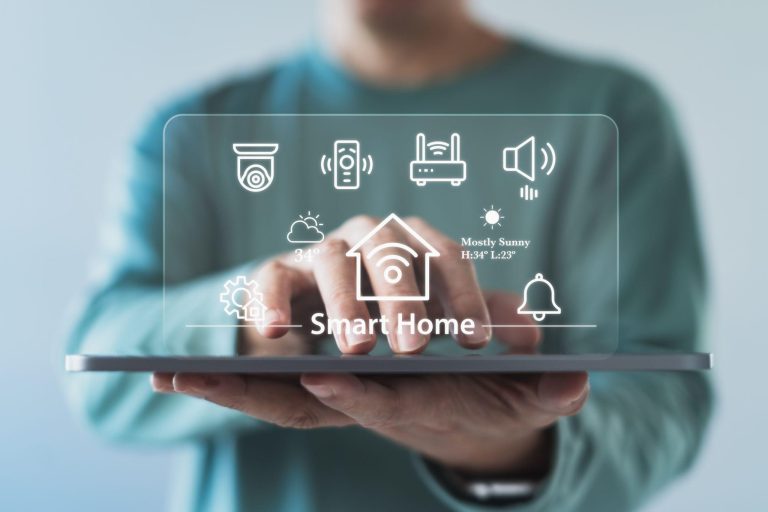 Person interacting with smart home display icons on transparent screen tablet